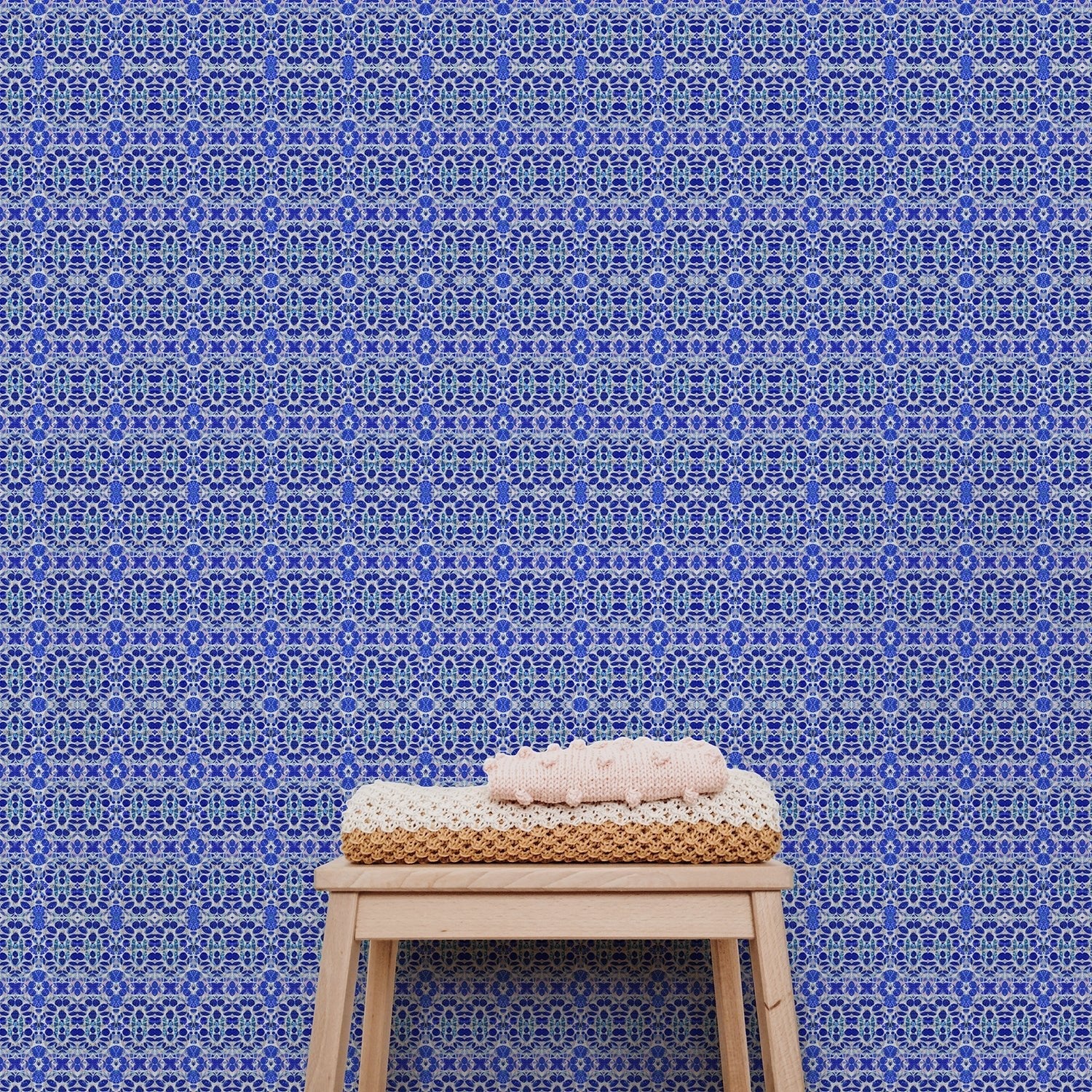 French country blue lace wallpaper shown on a wall in a nursery