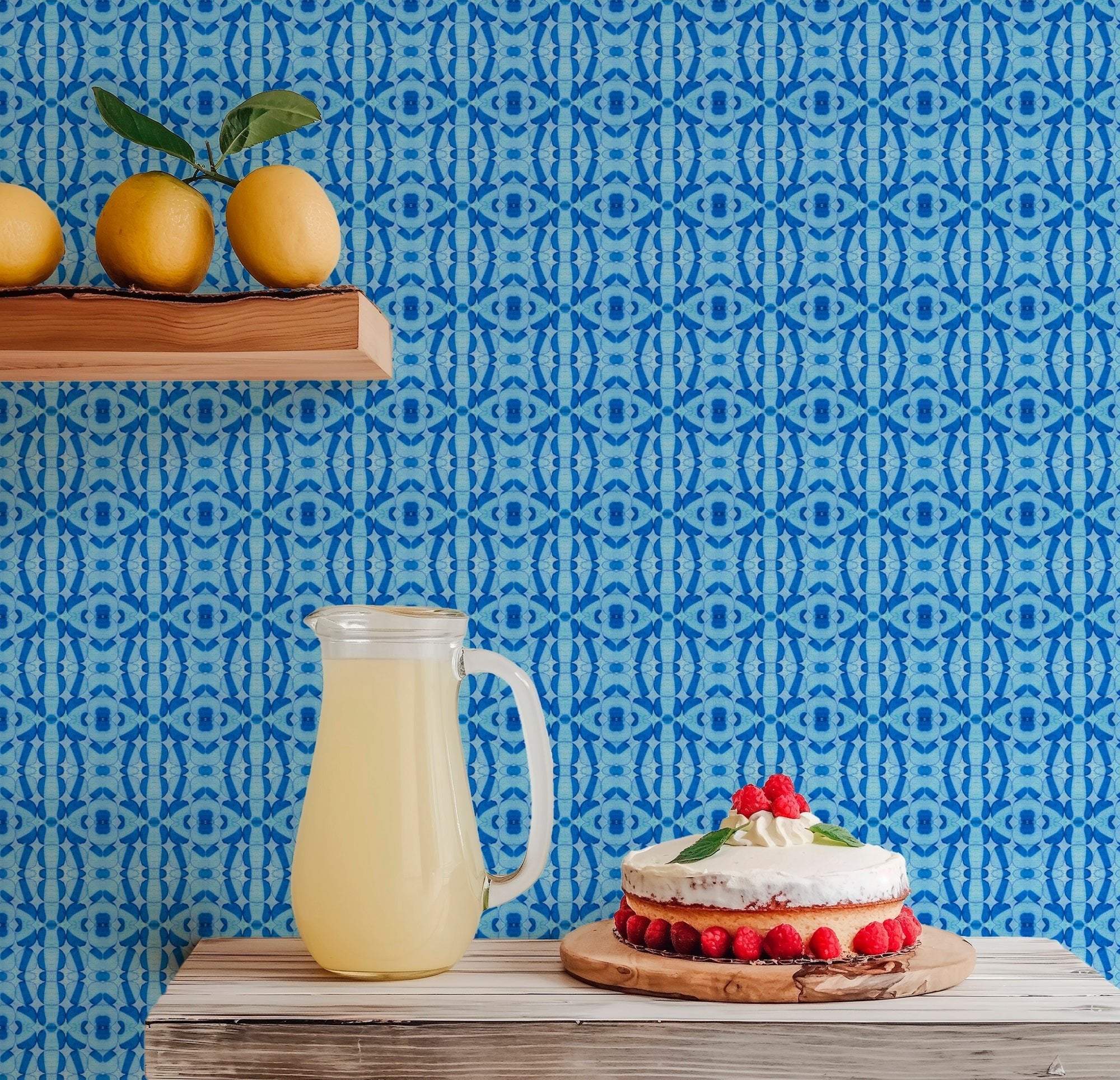 beachy blue wallpaper in a kitchen with a pitcher of lemonade and a pie on the counter