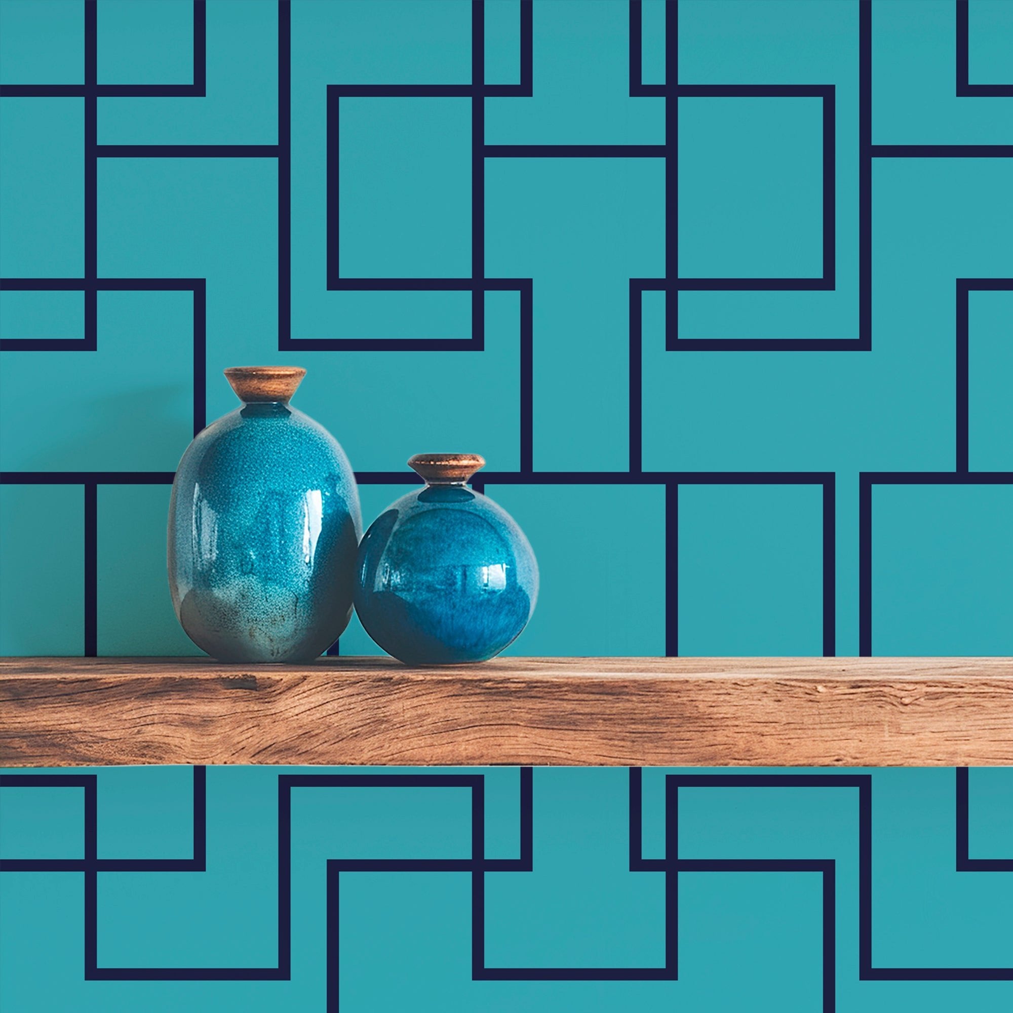 Ziggy turquoise and navy abstract wallpaper shown on a wall behind a wooden shelf