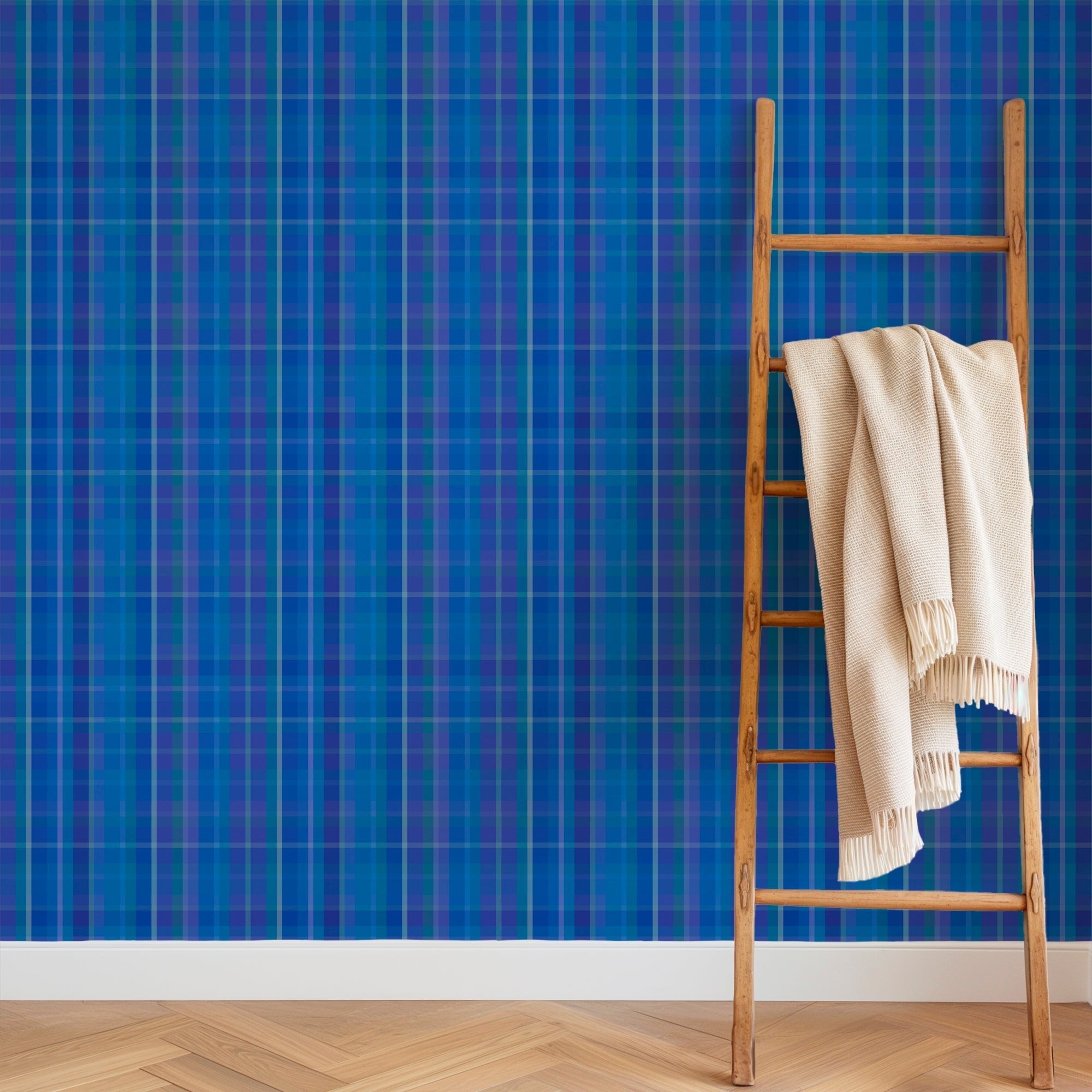 blue plaid victorian wallpaper on a wall behind a wooden decorative ladder