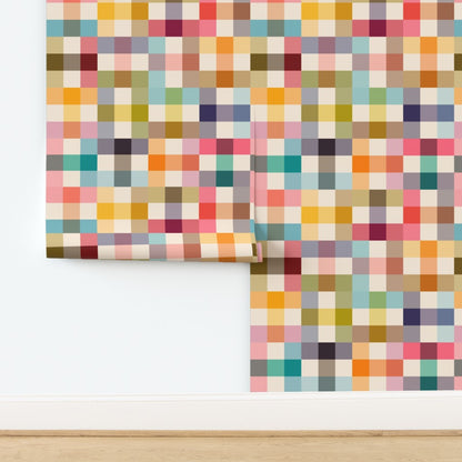 Two panels unrolled on a wall of Jellybean colorful grid wallpaper