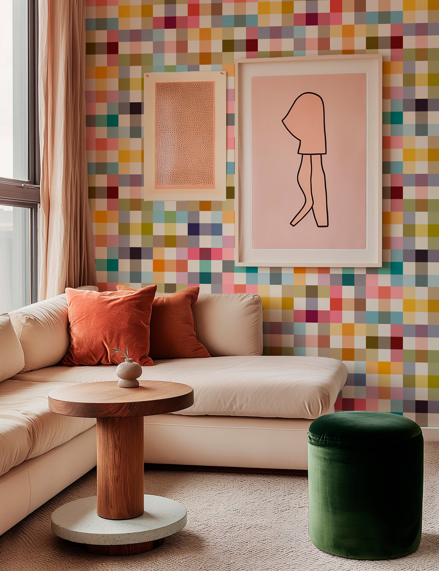 Jellybean colorful grid wallpaper shown in a pale pink living room with pink artwork on the wall